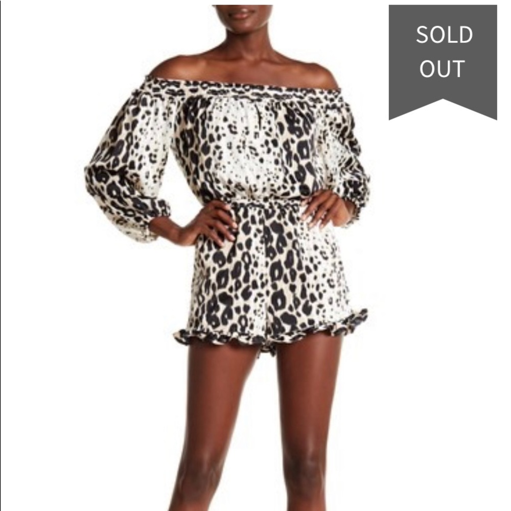 New Bebe Romper medium 
Leopard off shoulder
